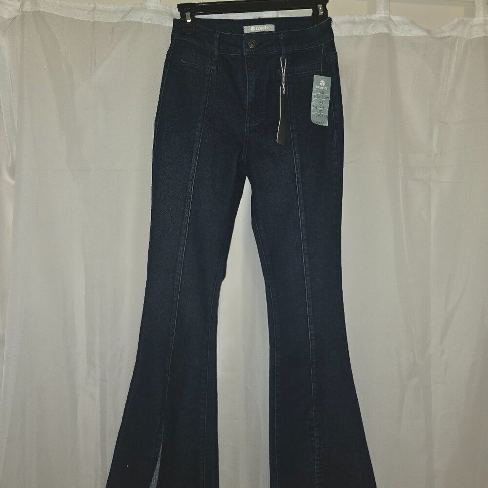 TRACTR dark denim flare with slit front leg and raw hem